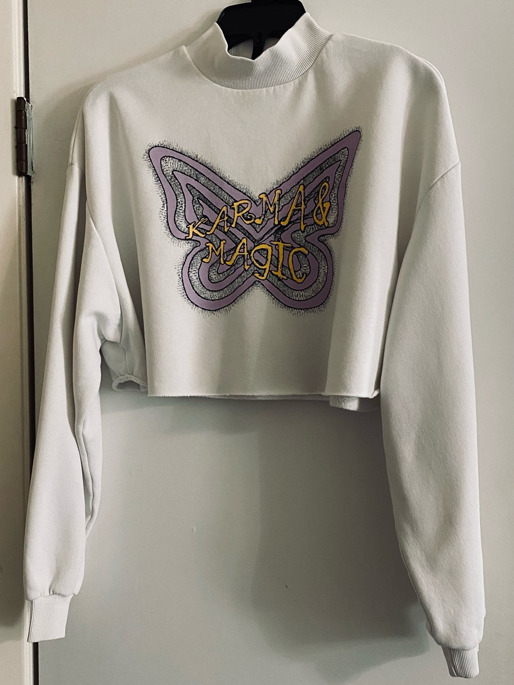 H-M Karma & Magic Cropped Mock-Neck Sweatshirt - White with Lavender Graphic